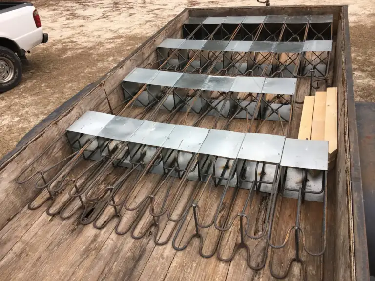 Row of Ty-Rite anchor assemblies with rebar cages loaded on a trailer for a job