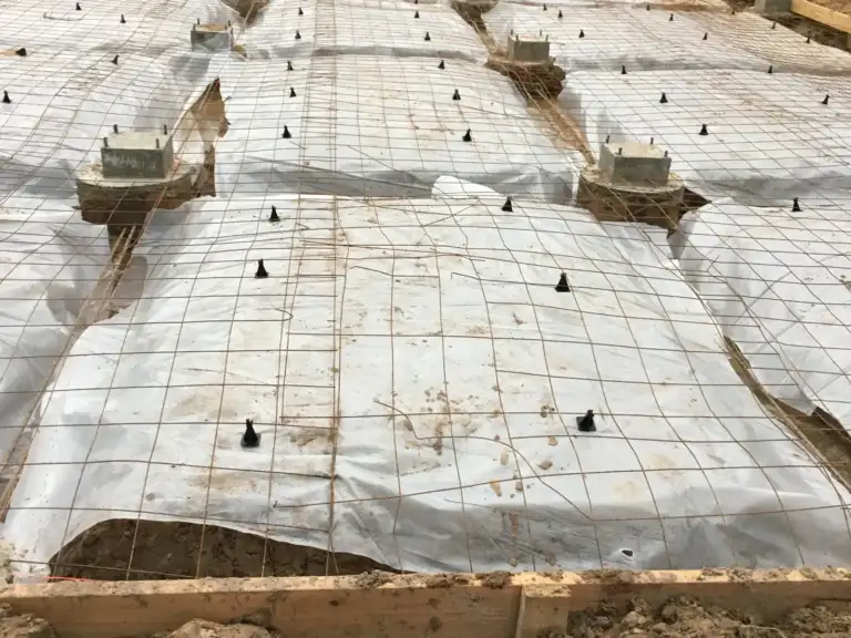 Footing rebar grid with Ty-Rite anchors laid out before the pour